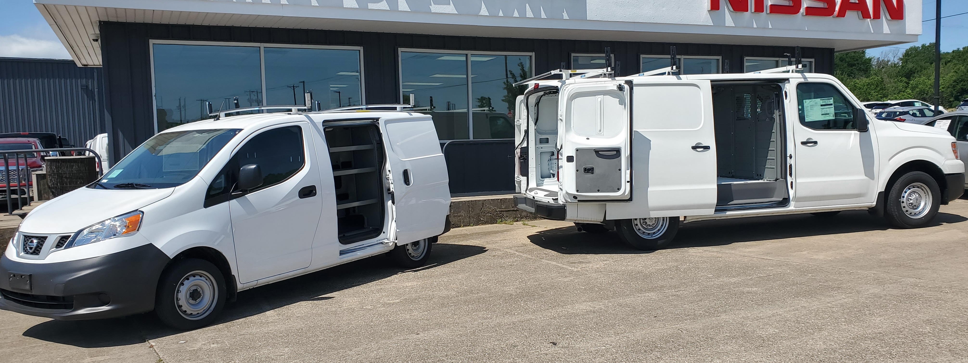 NV200 and NV2500 in front of office